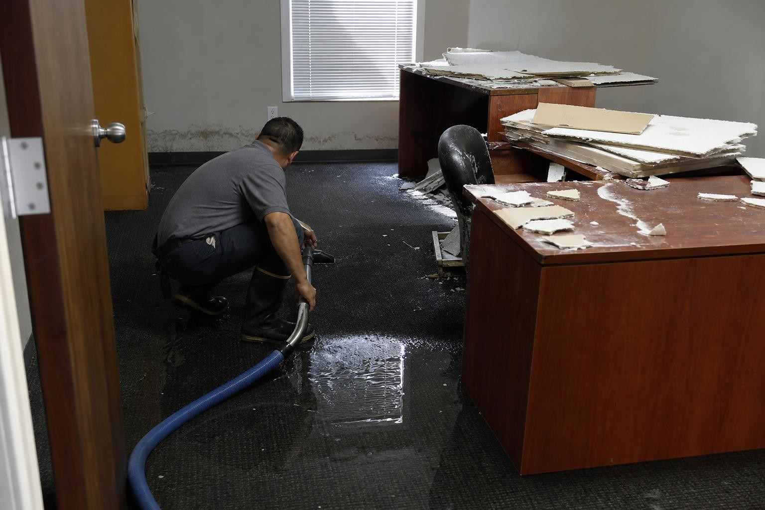 Water-damaged ceiling in a commercial building during commercial water damage restoration in Dallas TX